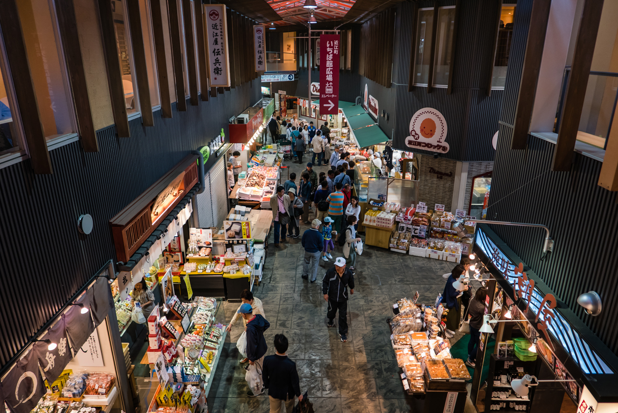 Kanazawa, Japan - May 4, 2016: People at Ohmicho Ichiba Fish Market in Kanazawa, Japan. It is the biggest fish market in Kanazawa. It selling all manner of freshly caught seafood.